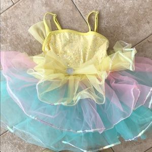 Pastel rainbow costume.